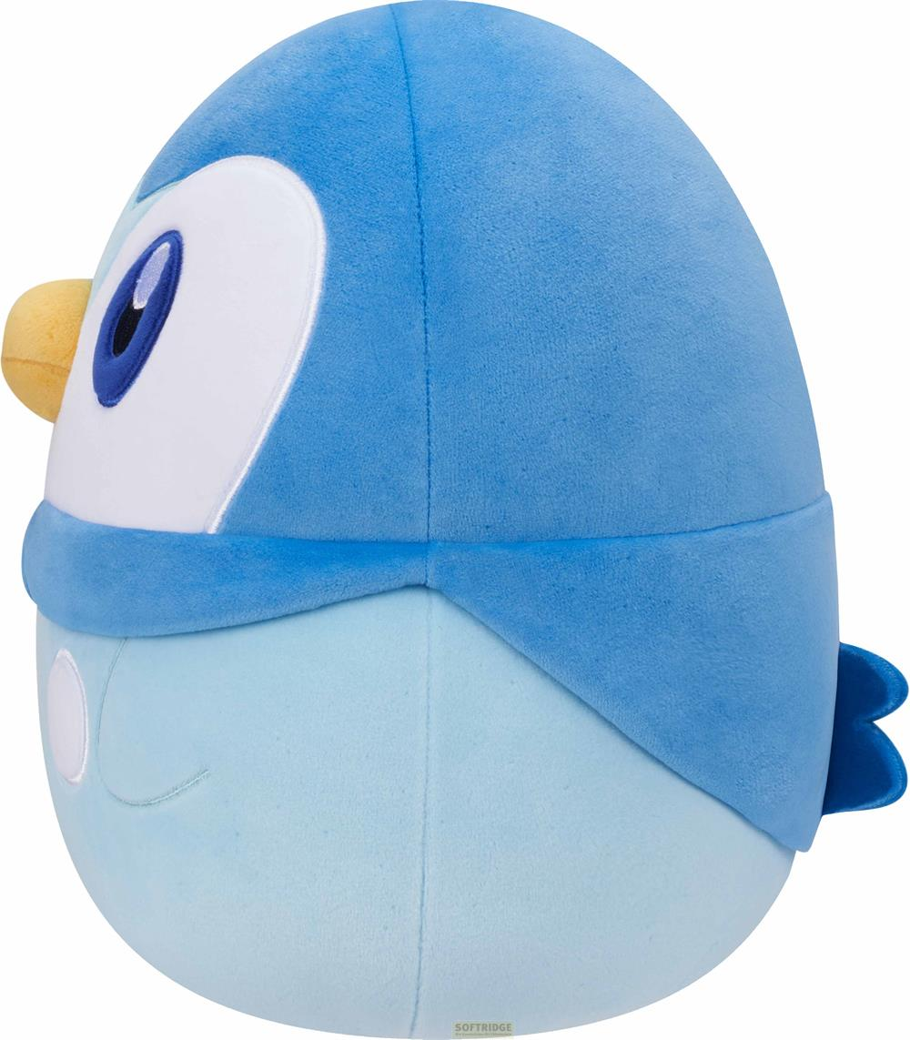 Ein blauer Plüschvogel mit gelbem Schnabel und weißen Akzenten.