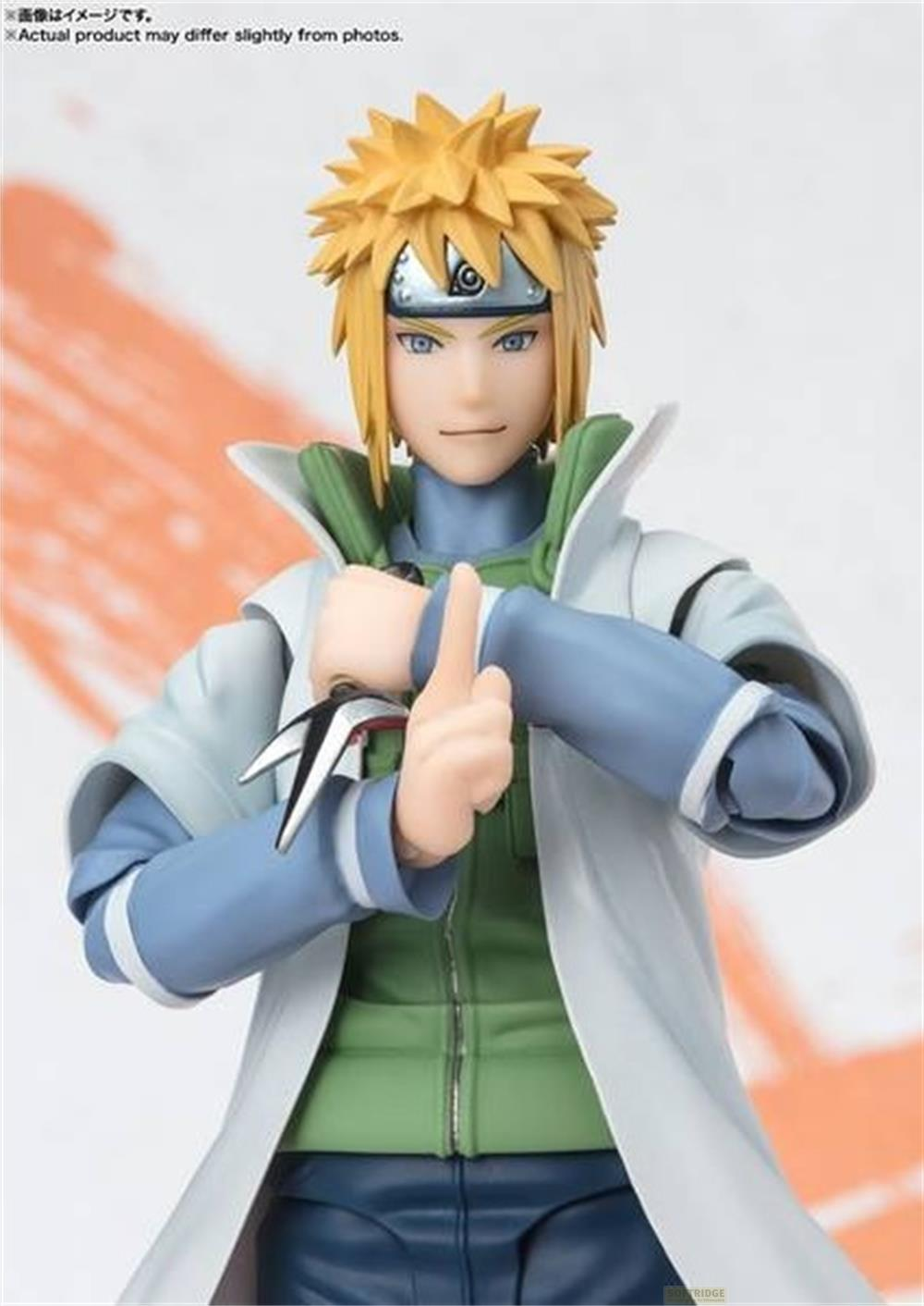 Figura di Minato Namikaze con capelli biondi, fascia e abiti blu.