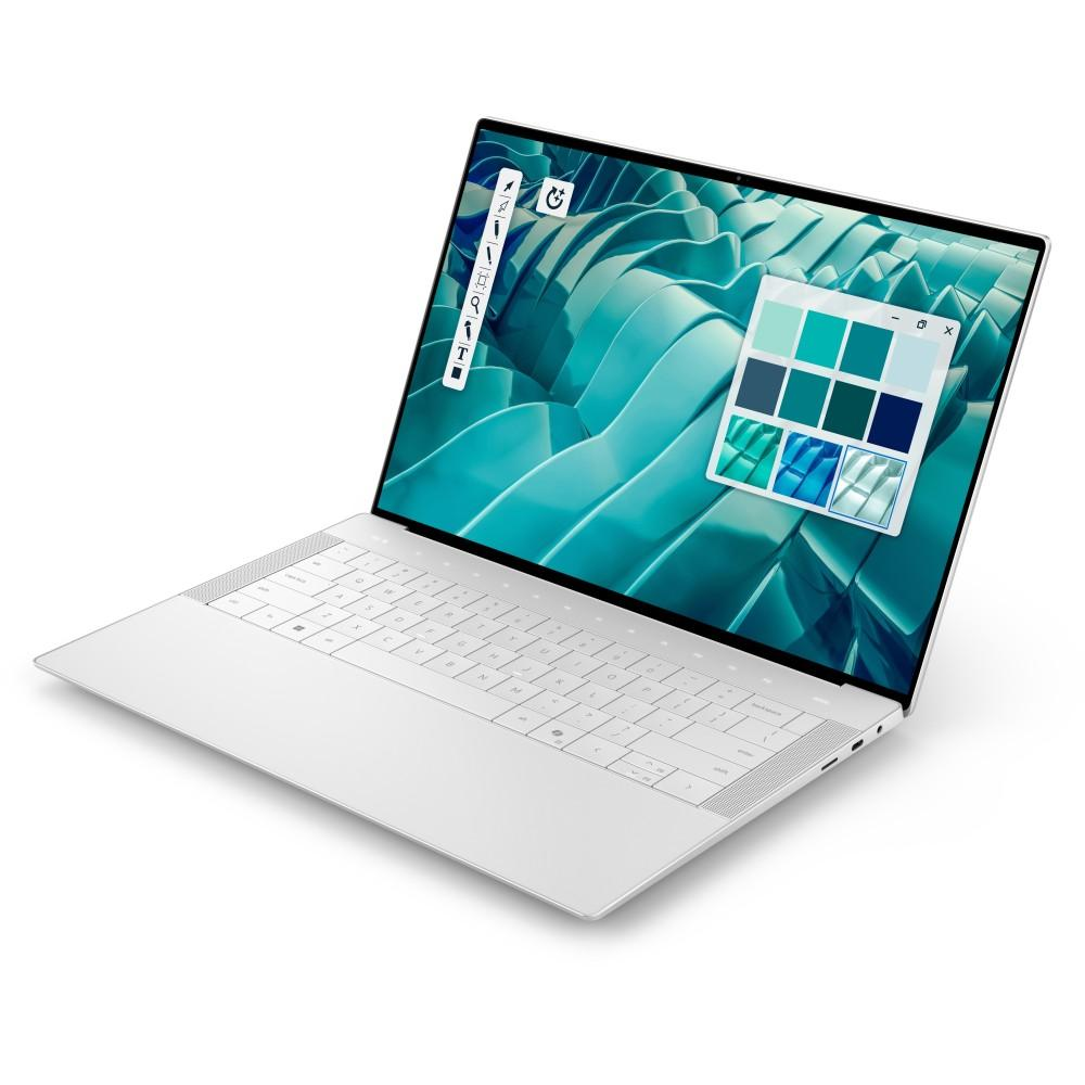 Portátil blanco con pantalla colorida que muestra herramientas de dibujo y paleta.