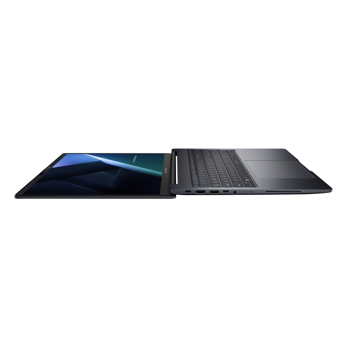 Un portátil abierto y oscuro con pantalla azul y teclado, visto de lado.
