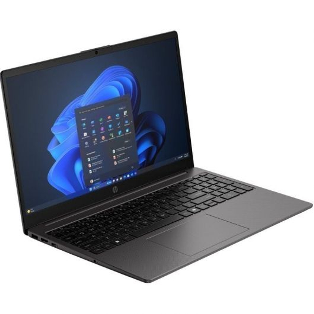 Un portátil negro cerrado que muestra un fondo azul con iconos de aplicaciones.