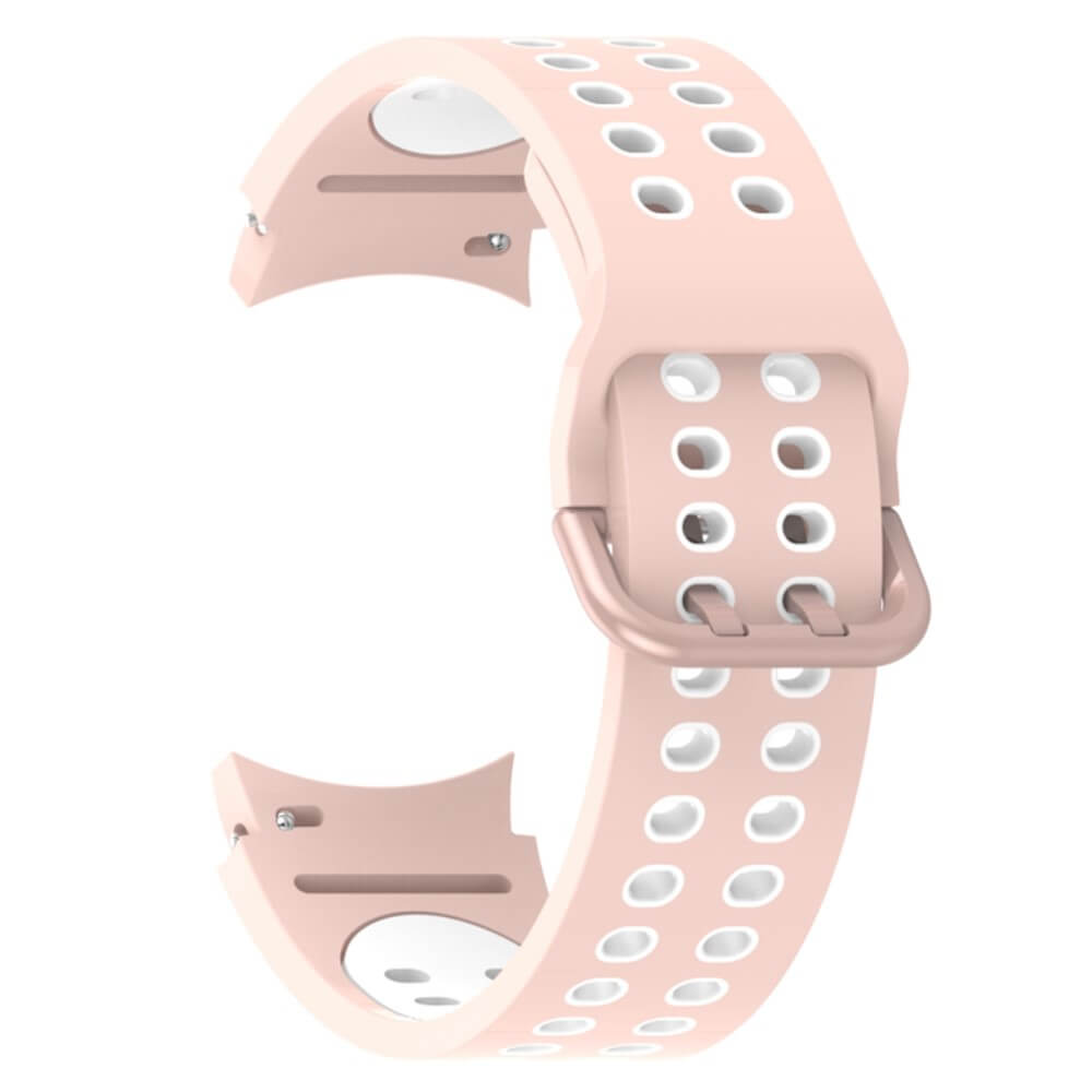 Un cinturino per orologio rosa chiaro con fori bianchi e fibbia oro rosa.