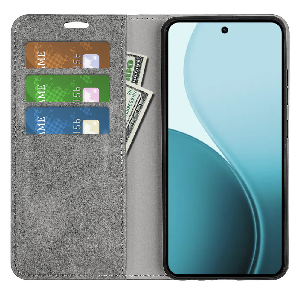 Étui de téléphone gris avec fentes pour cartes et billets à côté d'un smartphone.