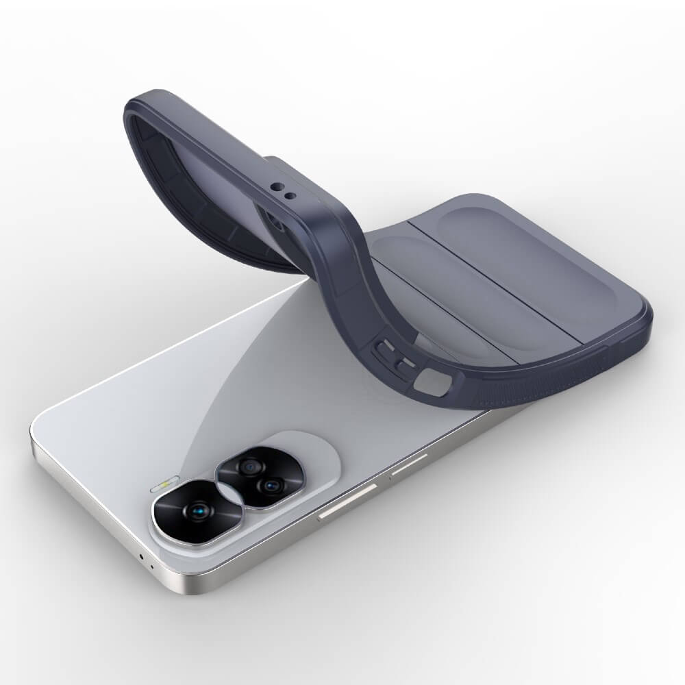 Une coque de téléphone gris foncé est placée sur un smartphone blanc.