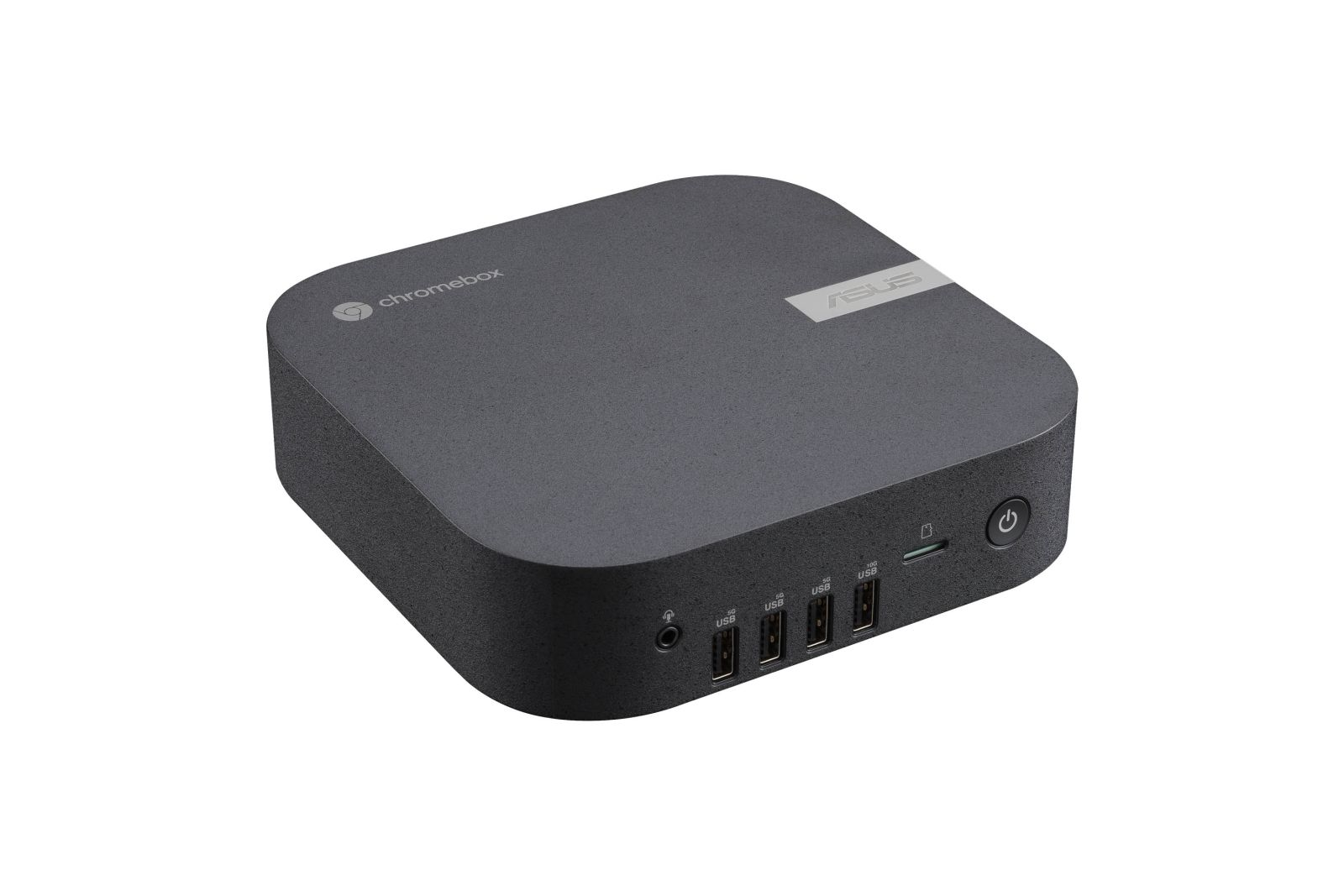 Un ordenador Asus Chromebox compacto y oscuro con puertos USB y botón de encendido.