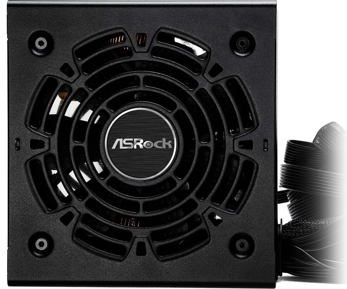 Czarny zasilacz z kratką wentylatora i logo ASRock. Pęk kabli po prawej.