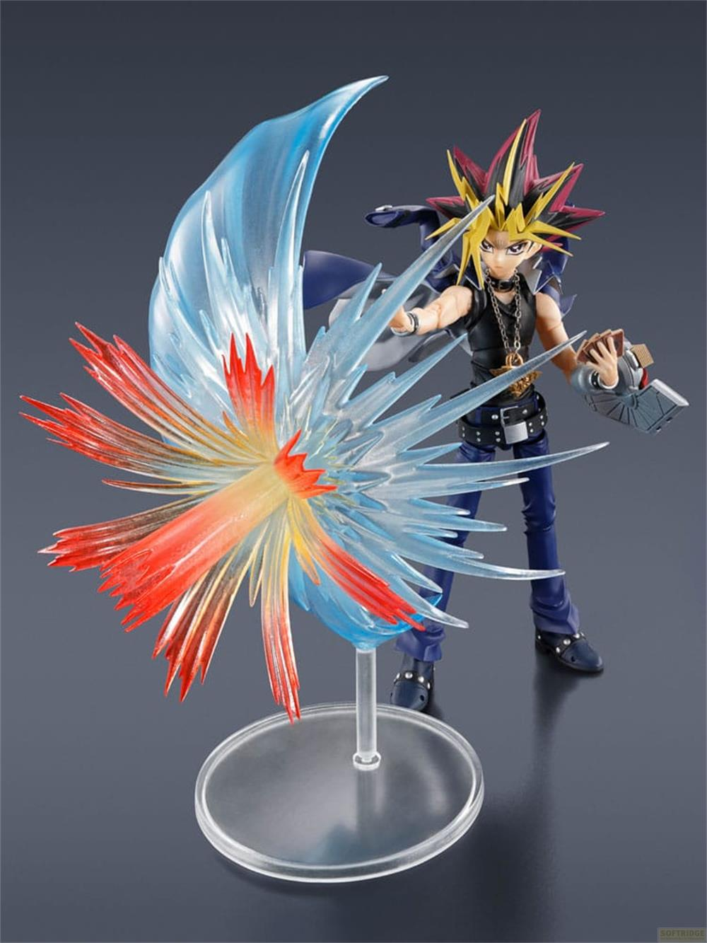 Yugi Muto Figur mit einem blauen und roten Energieeffekt.
