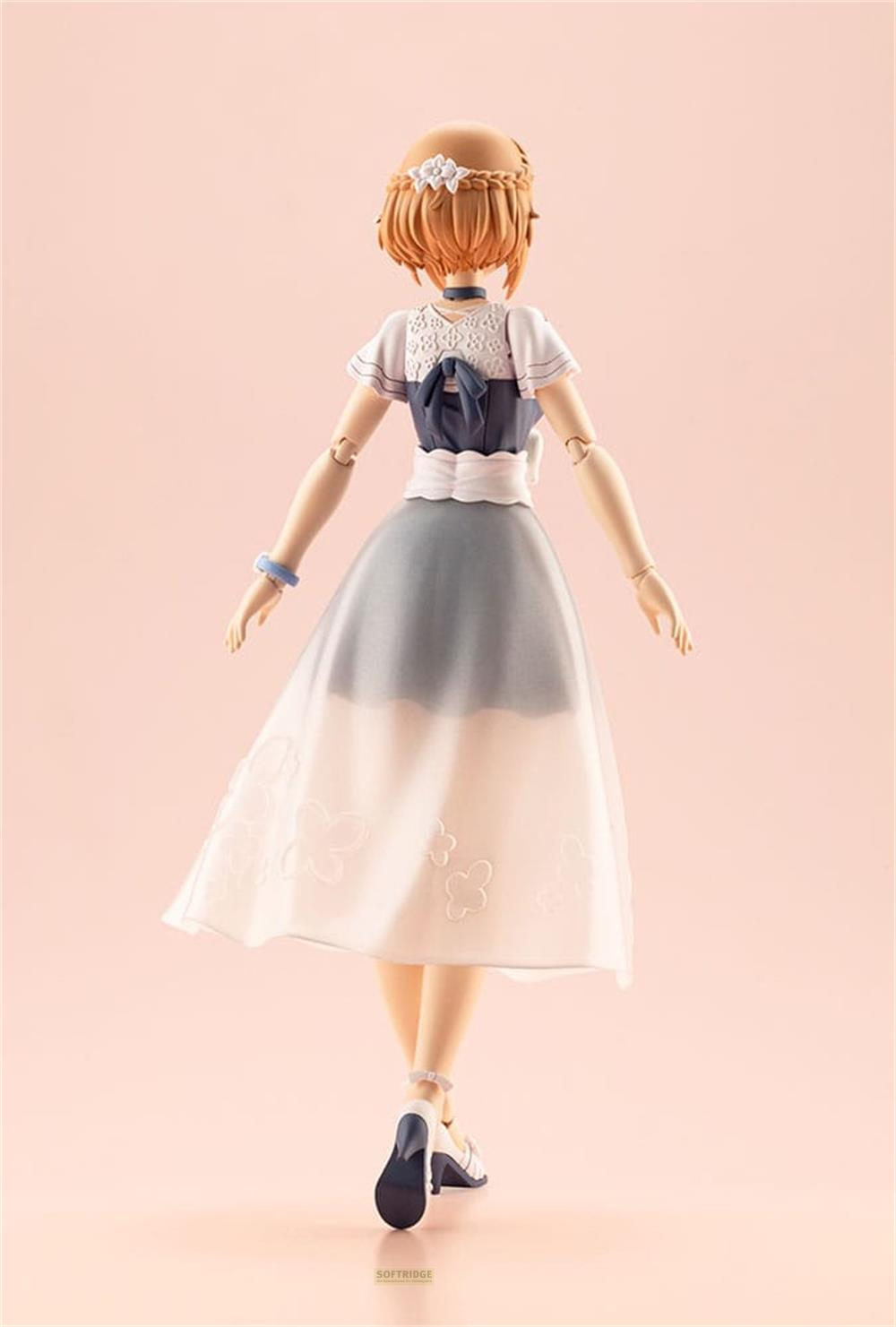 Eine Figur mit orangefarbenem Haar und einem weißen Kleid mit blauer Taille.