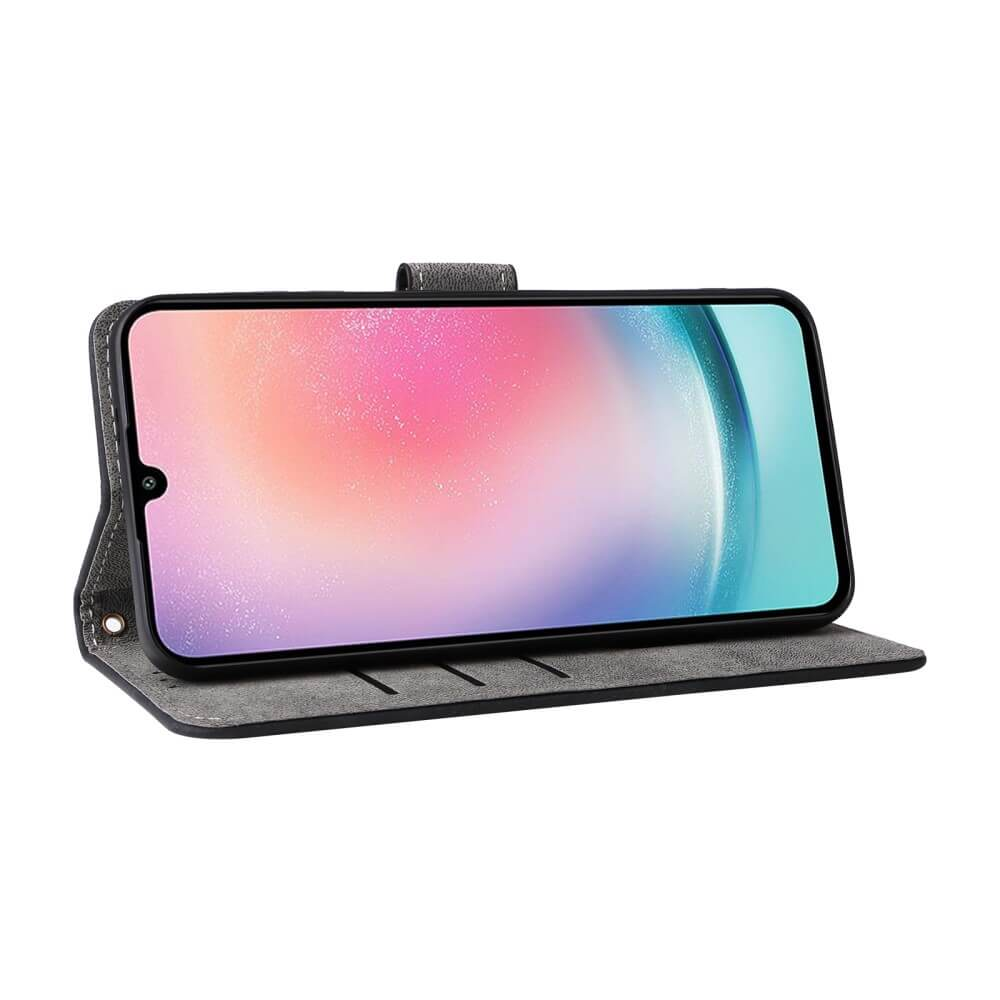 Uno smartphone in una custodia a libro grigia con uno sfondo colorato.
