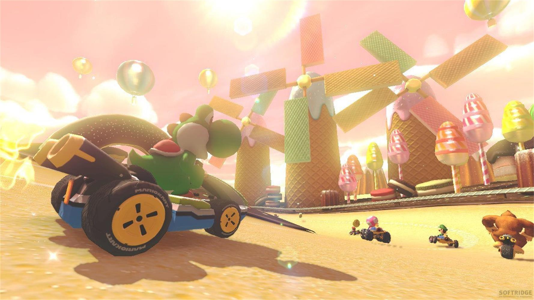 Yoshi corre in un kart attraverso un mondo di caramelle con mulini a cono gelato.