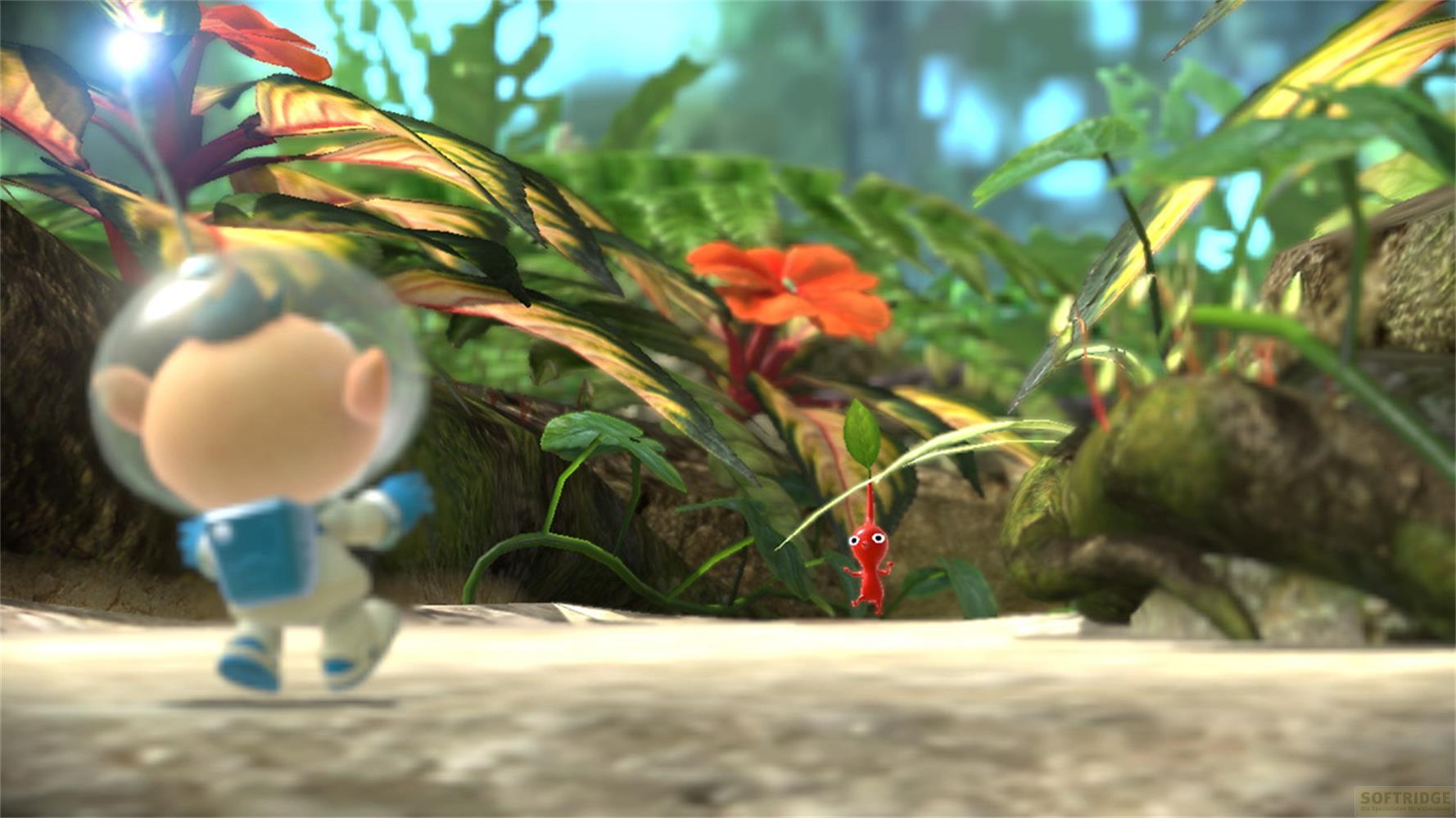 Un astronauta con casco e tuta spaziale guarda un piccolo Pikmin rosso.