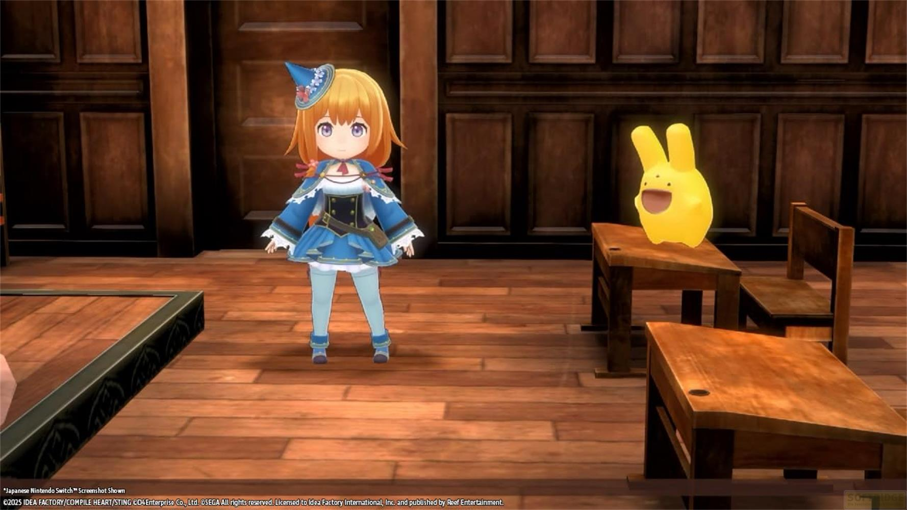 Una ragazza anime in abiti blu sta accanto a una creatura gialla.