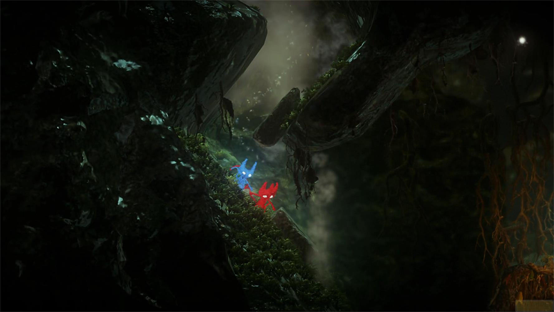 Deux petites créatures, une rouge, une bleue, sur un sol moussu dans une forêt sombre.
