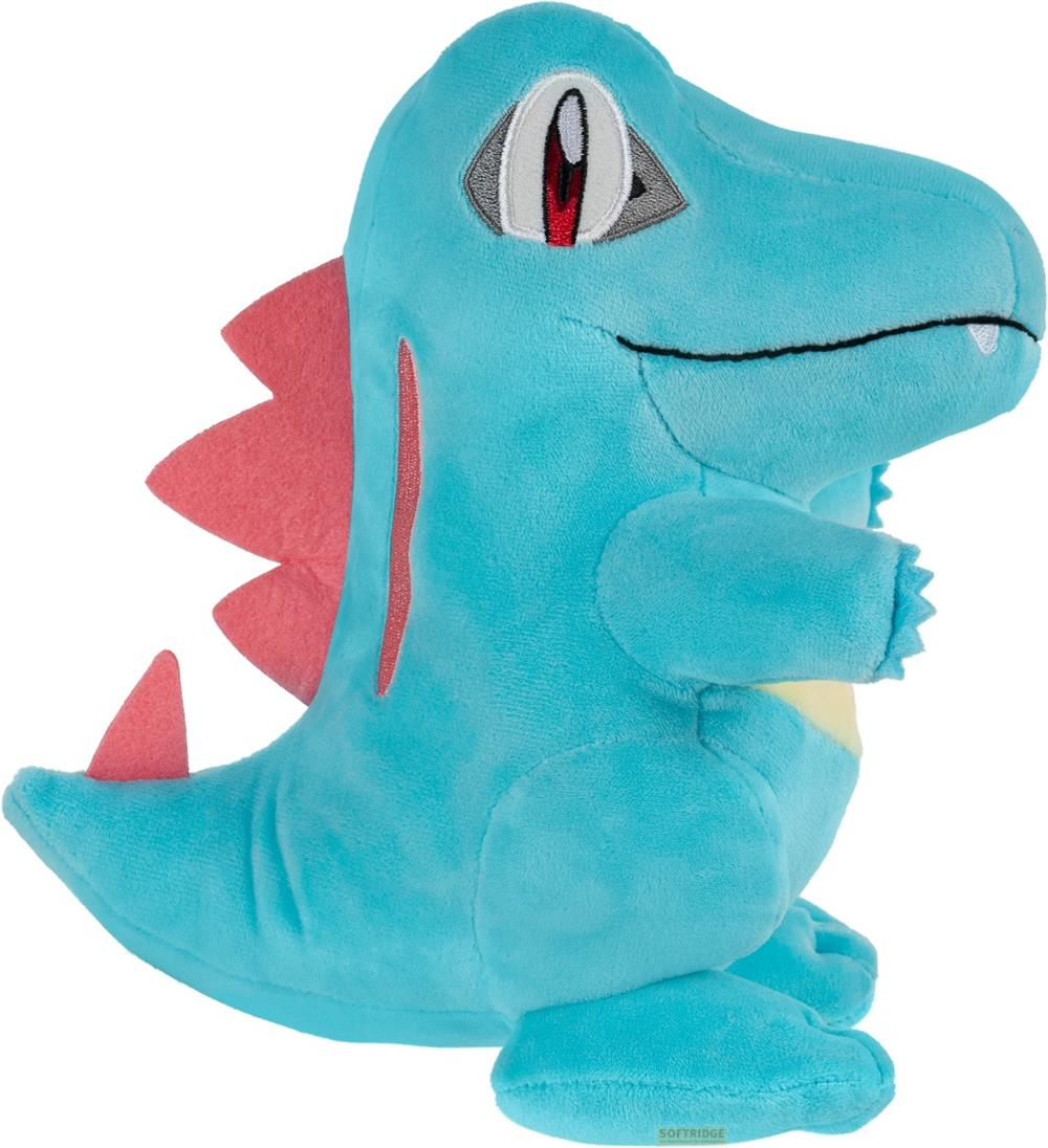 Ein blauer Plüsch-Totodile mit roten Stacheln und gelbem Bauch.