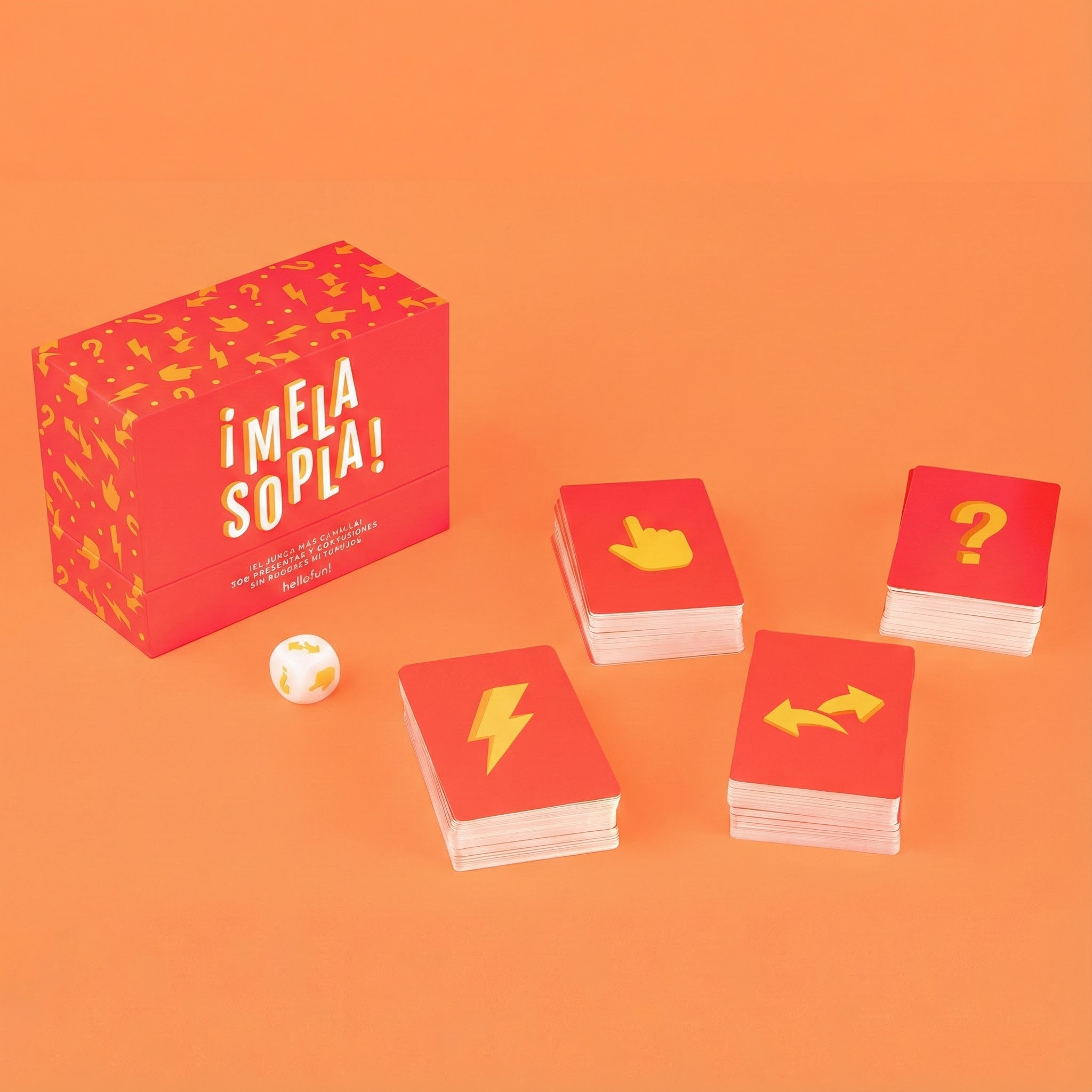 Una caja de juego roja con símbolos amarillos, un dado y cartas.