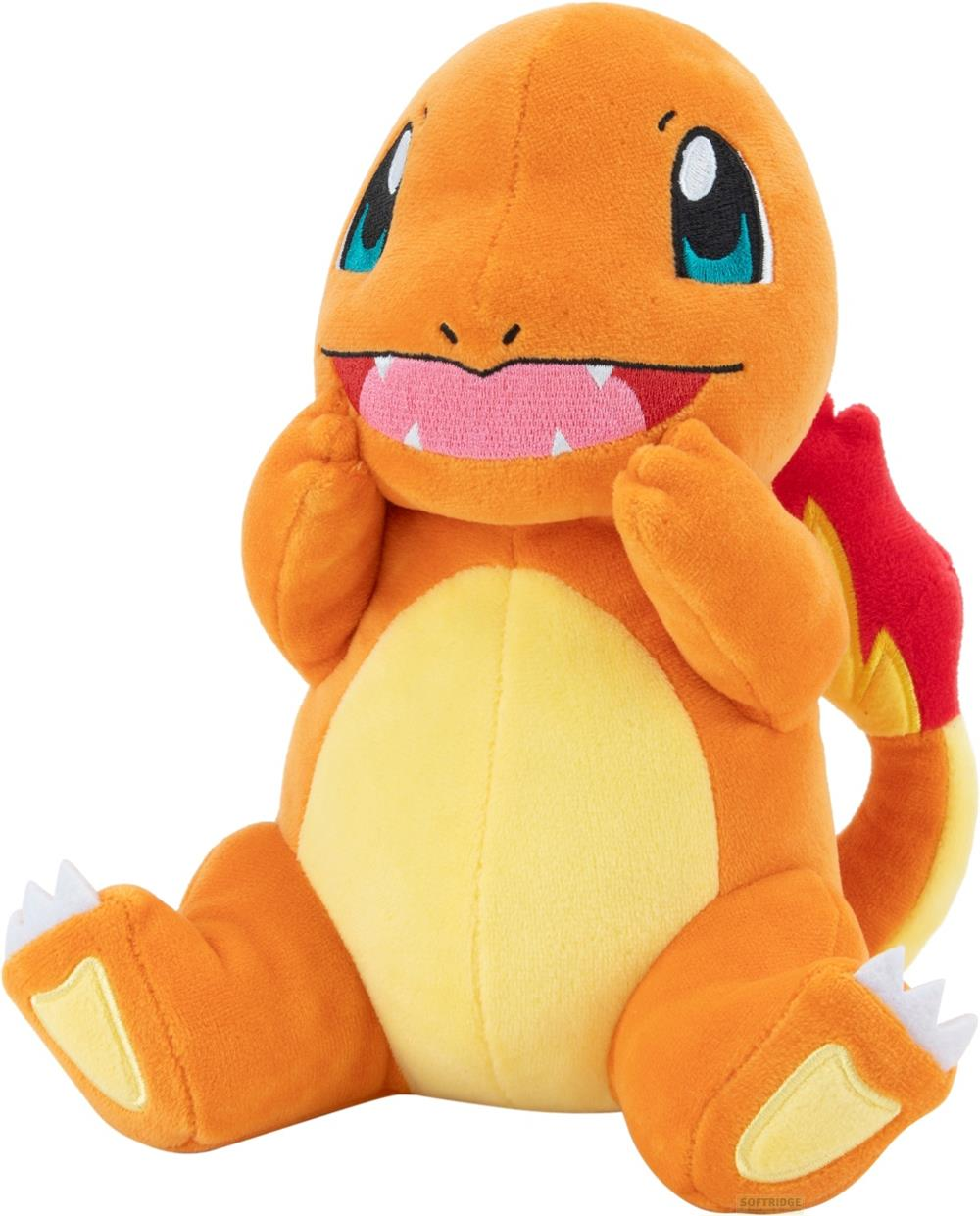 Ein orangefarbener Charmander-Plüsch sitzt mit den Pfoten am Gesicht, mit gelbem Bauch und Flamme am Schwanz.