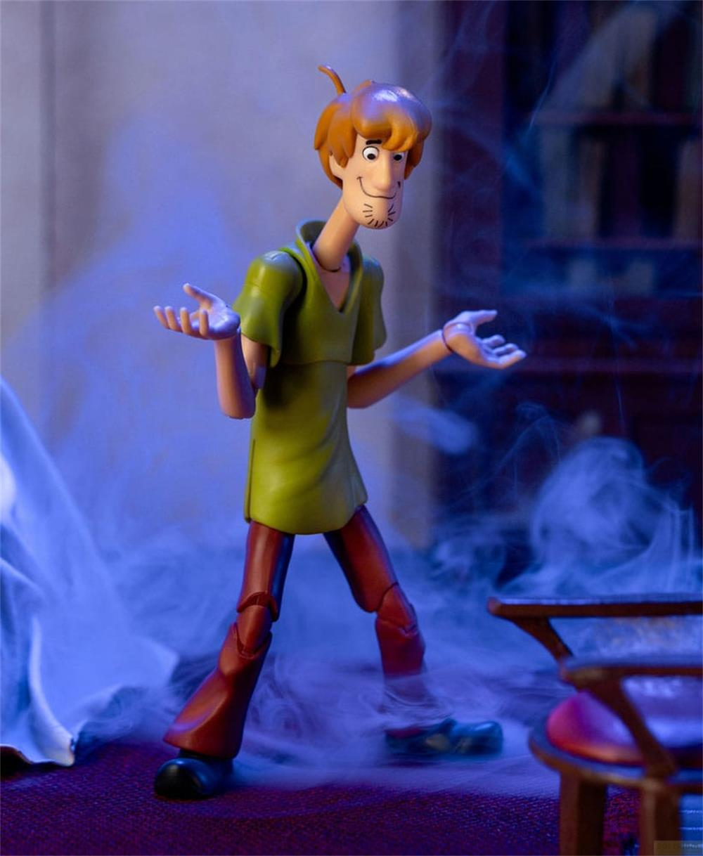 Figura di Shaggy in tunica verde e pantaloni marroni, circondato da fumo.