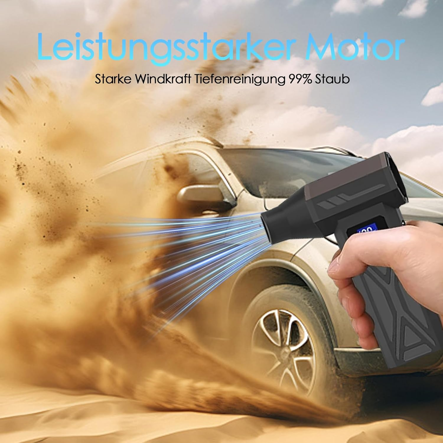 Ein schwarzer Gebläse reinigt ein Auto im Sand. Blaue Strahlen fliegen aus dem Gerät.