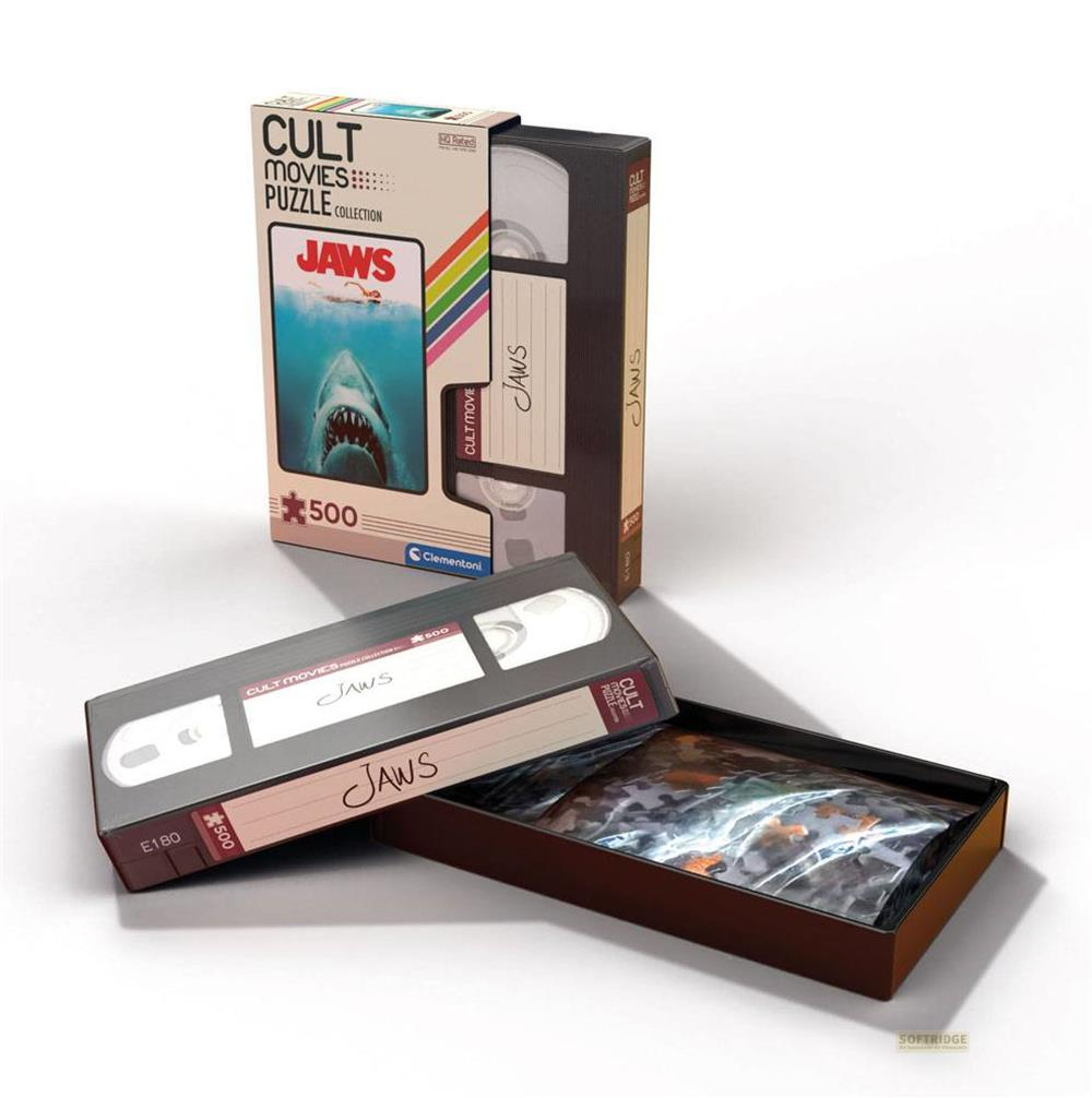 Zestaw puzzli Jaws w stylu VHS z otwartym pudełkiem i widocznymi elementami.