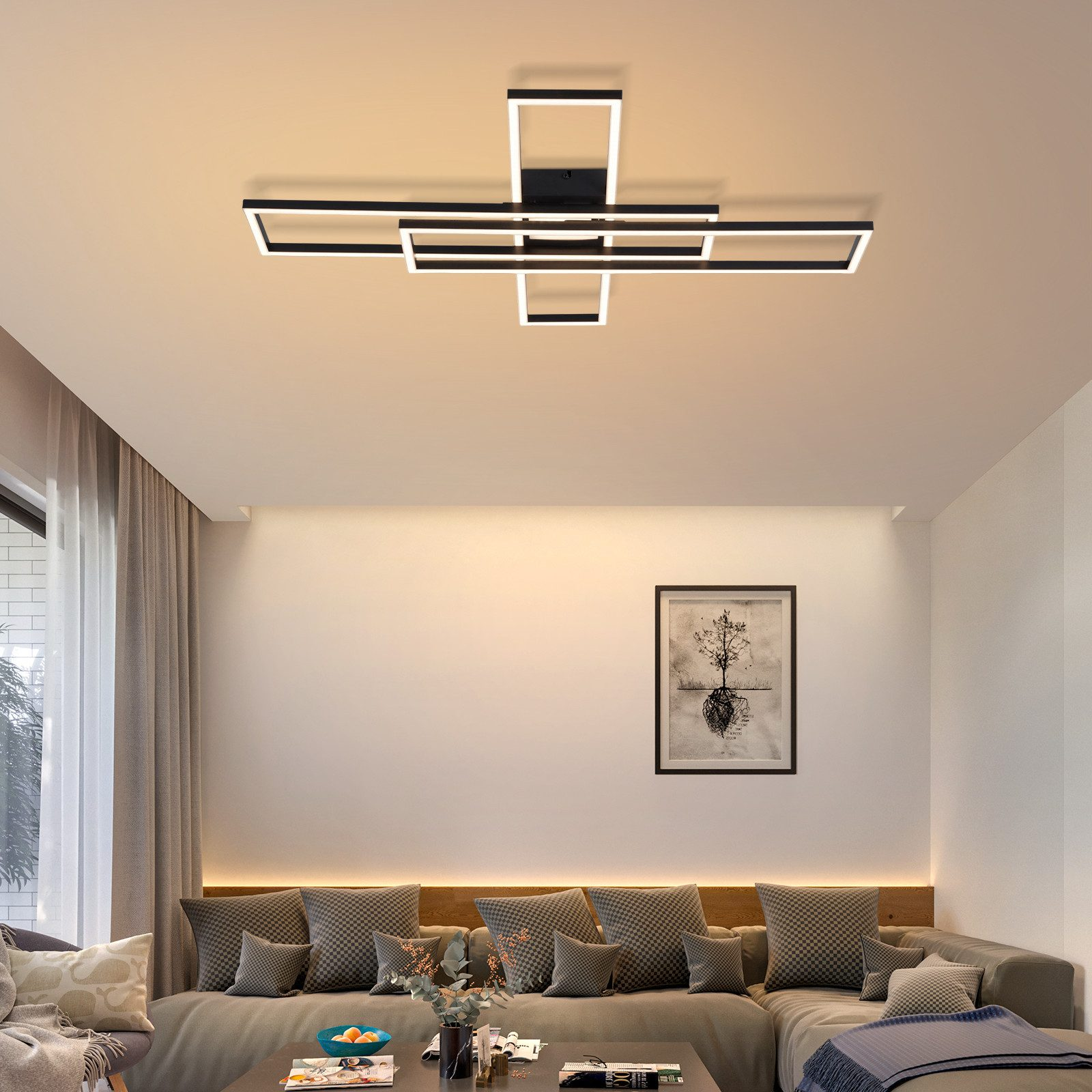 Un soggiorno moderno con divano a L, un'opera d'arte e un lampadario geometrico.