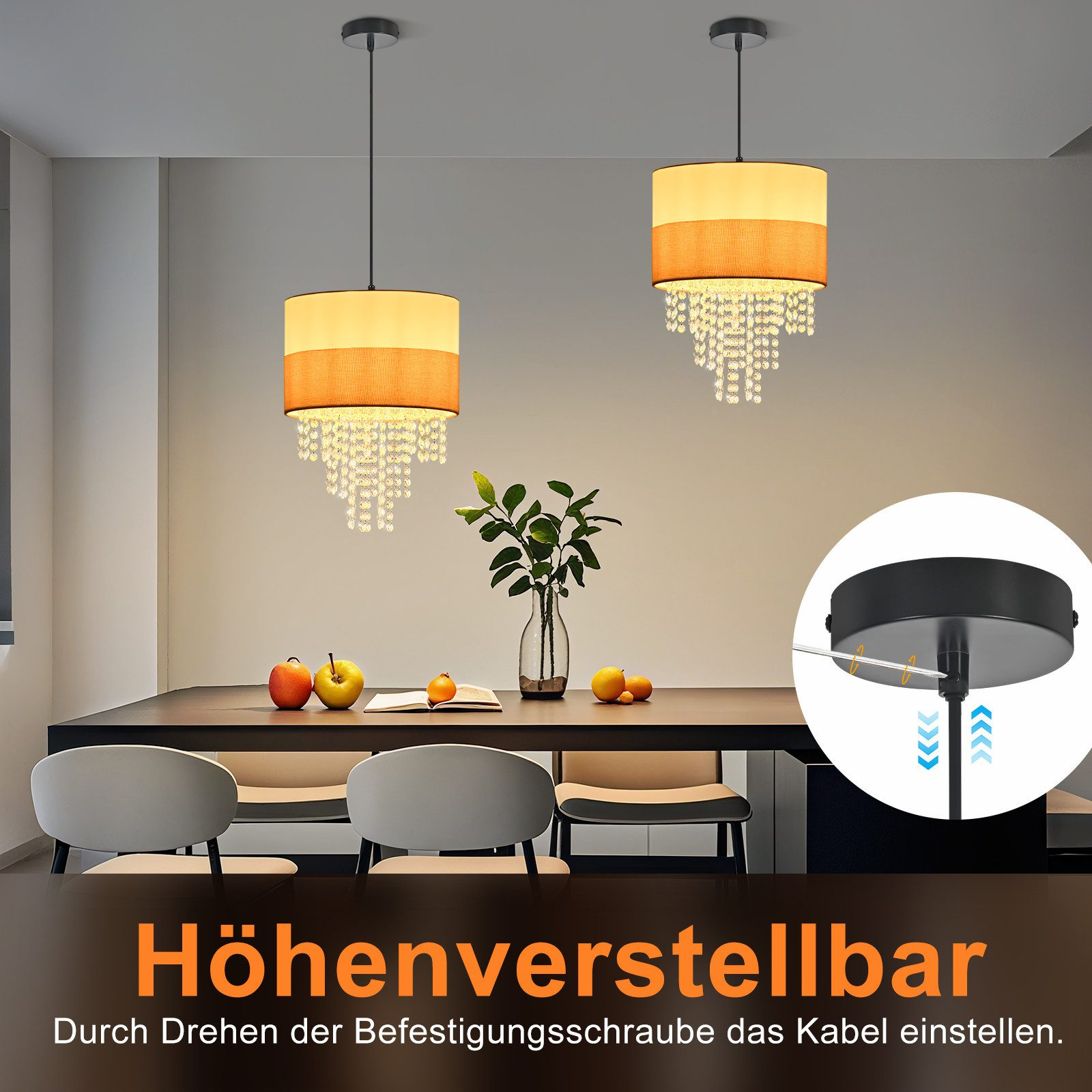 Zwei Hängelampen mit Stoffschirmen und Kristallbehang über einem Esstisch.