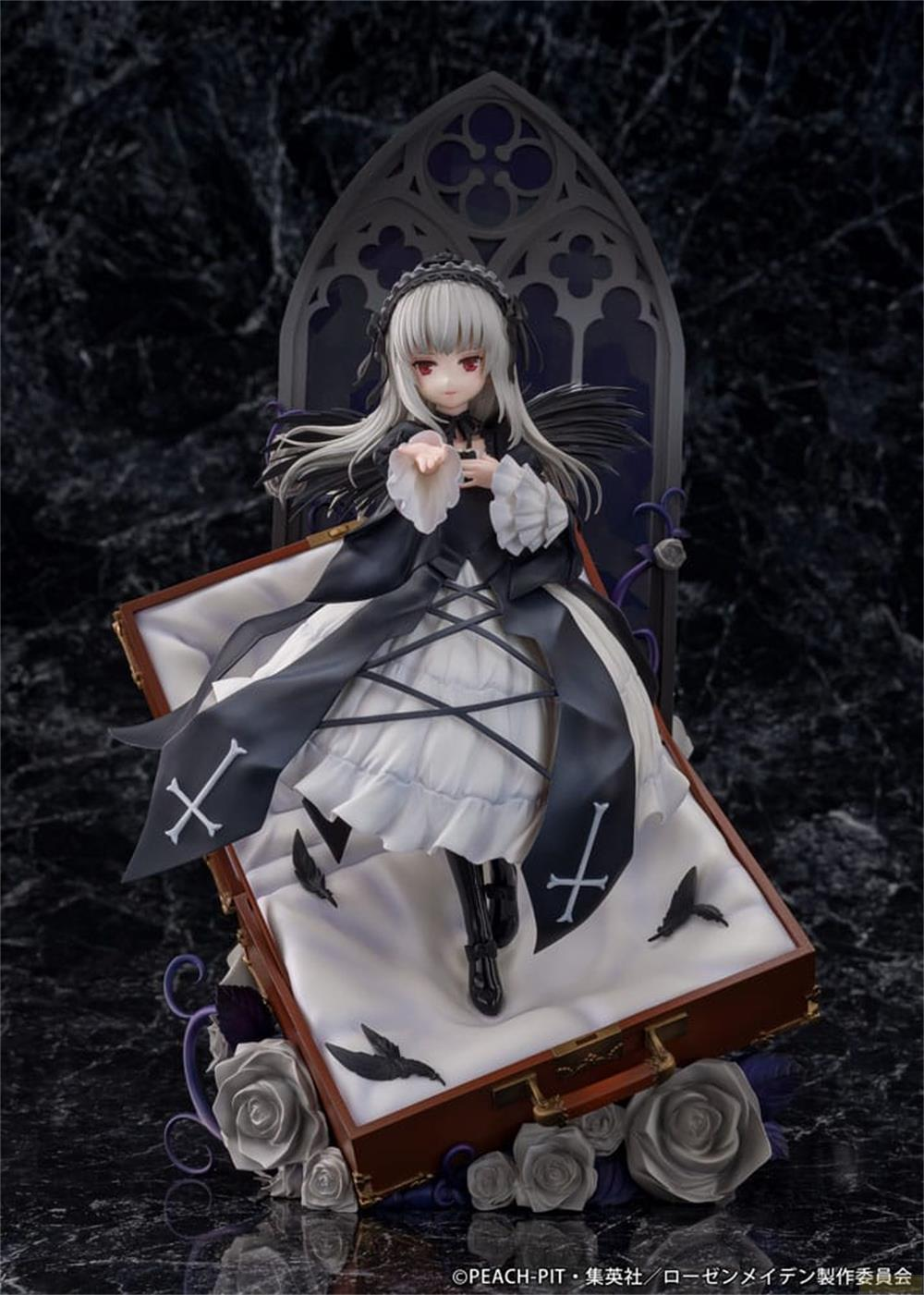 Figur einer Anime-Figur mit weißem Haar, rotem Auge, in einem Sarg mit Rosen.