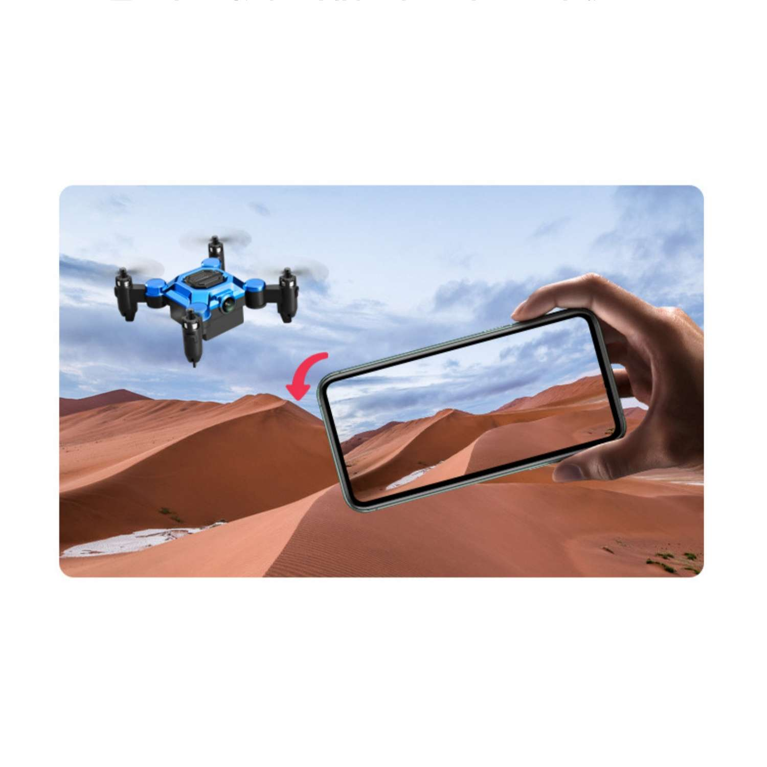 Eine blaue Drohne fliegt über Sanddünen, während ein Handy die Szene filmt.