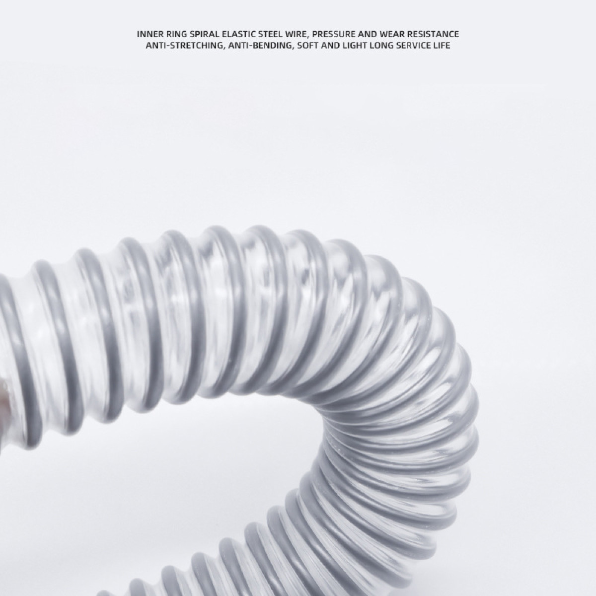 Gray flexible hose with spiral structure, close-up.