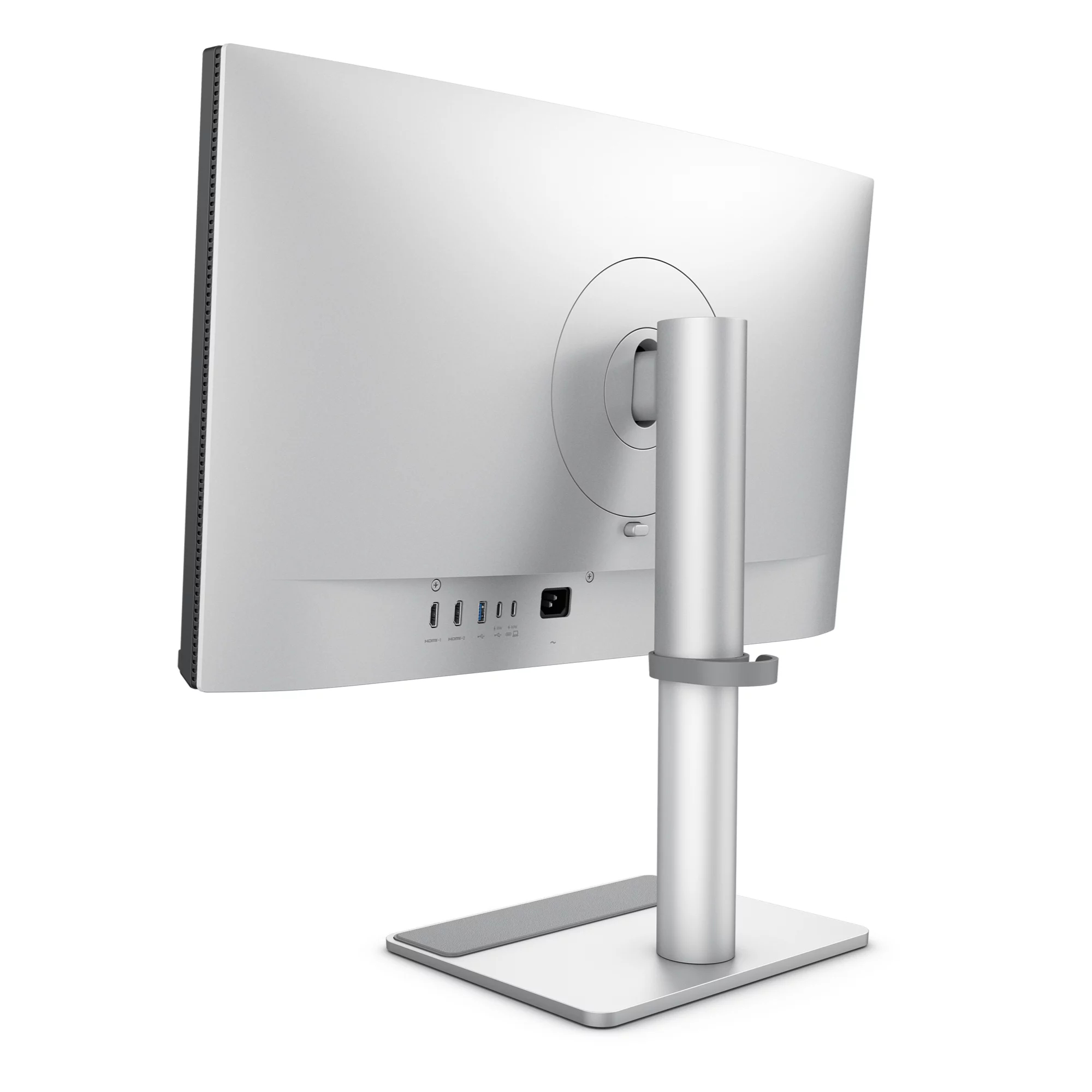 Back view of a silver monitor with ports and a round stand.