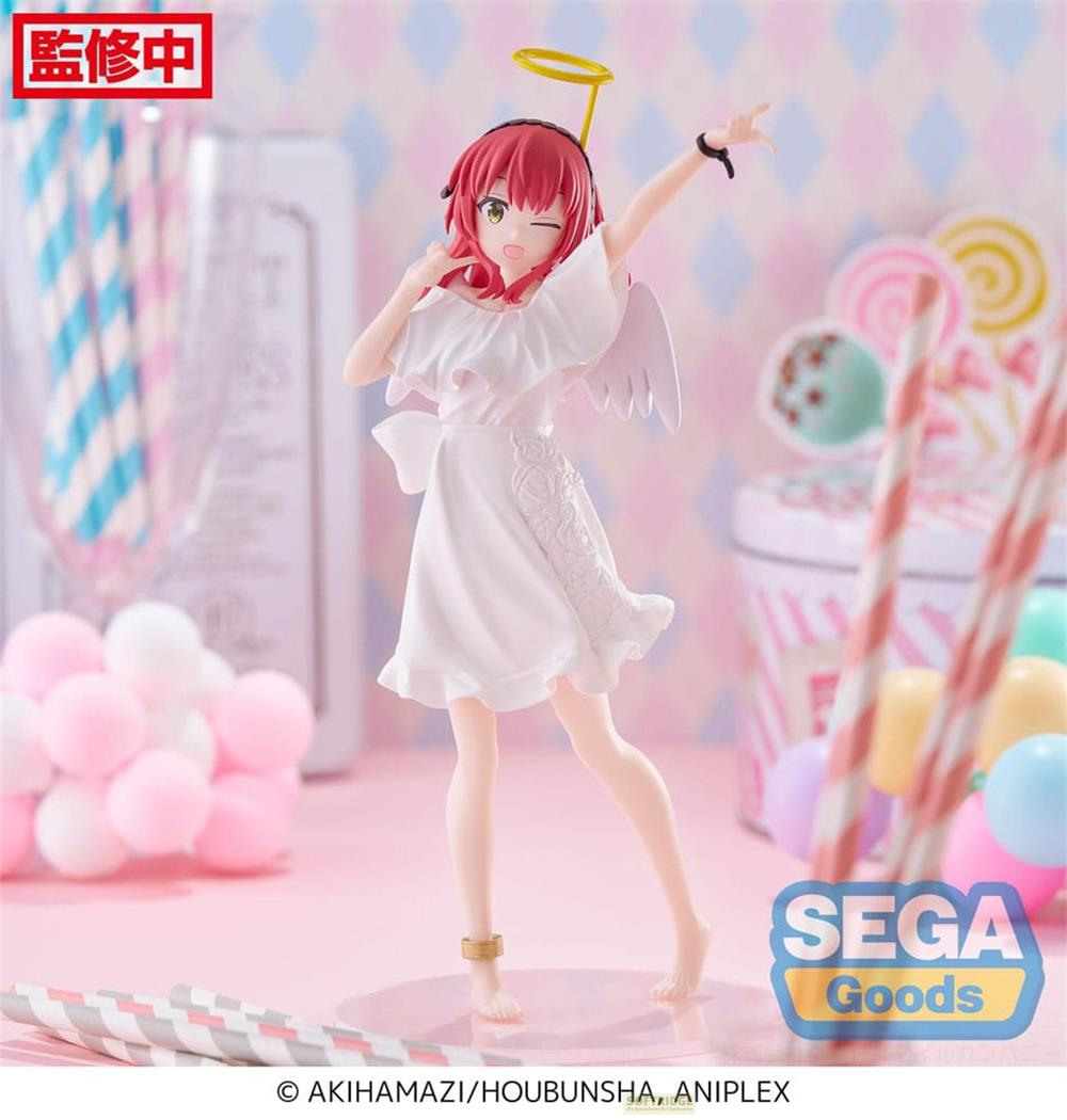 Eine Figur mit roten Haaren in einem weißen Kleid mit Flügeln und Heiligenschein.