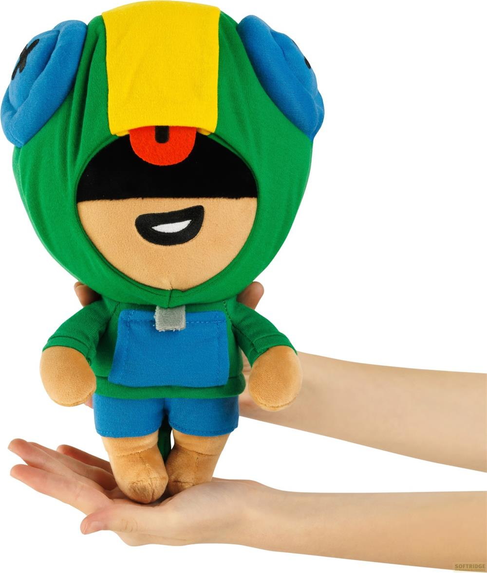 Peluche verde con orecchie blu e toppa gialla sulla testa.