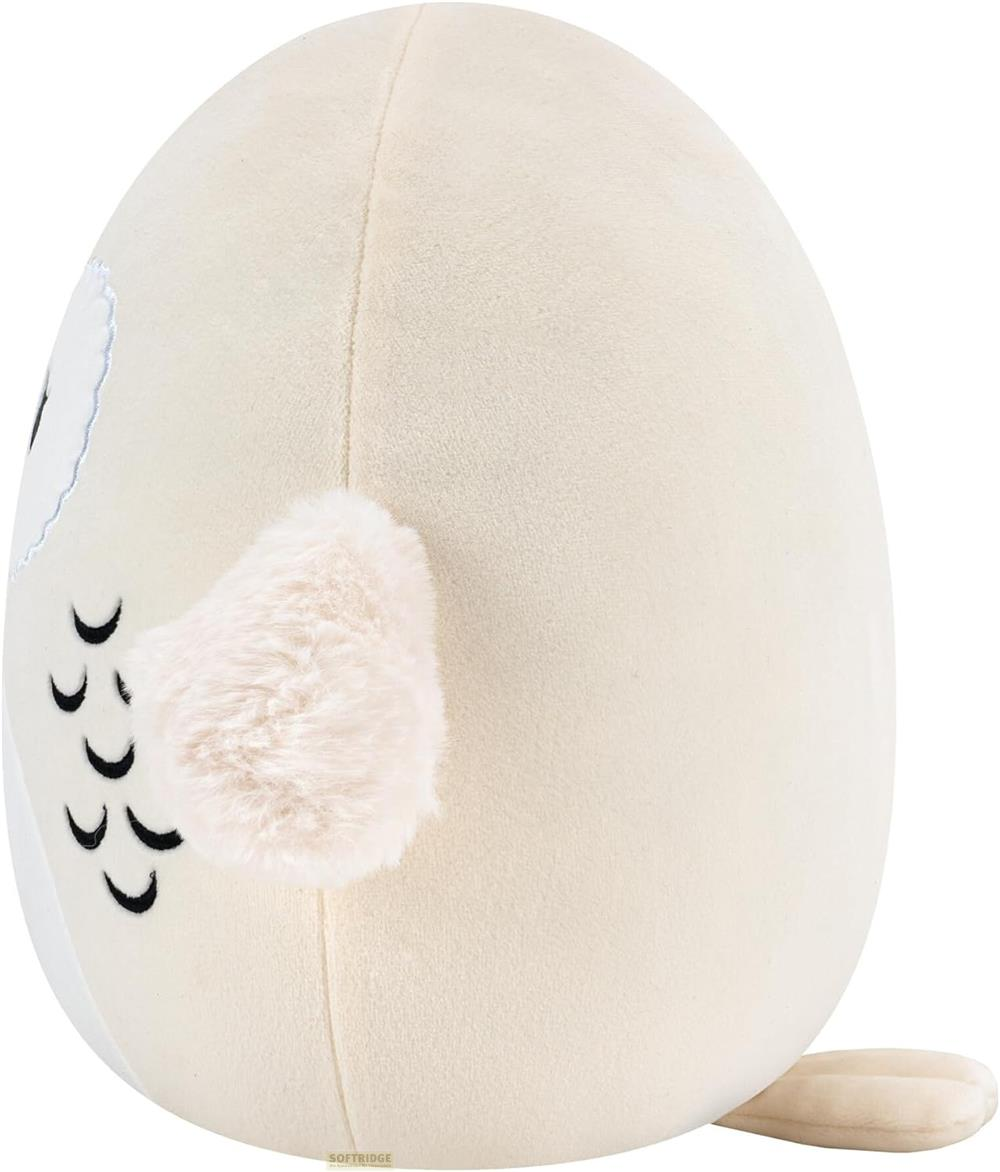 Ein cremefarbener Plüsch-Eule mit schwarzen Augen und einem flauschigen Schwanz.