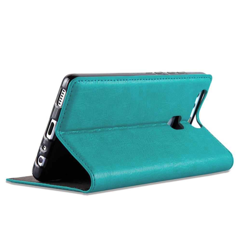 Funda de teléfono abatible turquesa con soporte, sobre blanco.