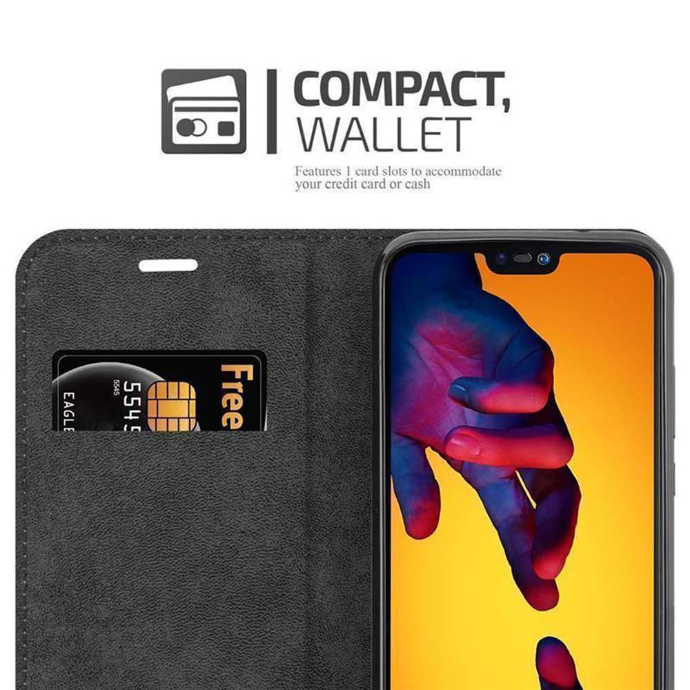 Ein schwarzes Portemonnaie mit einer Karte und einem Handy.