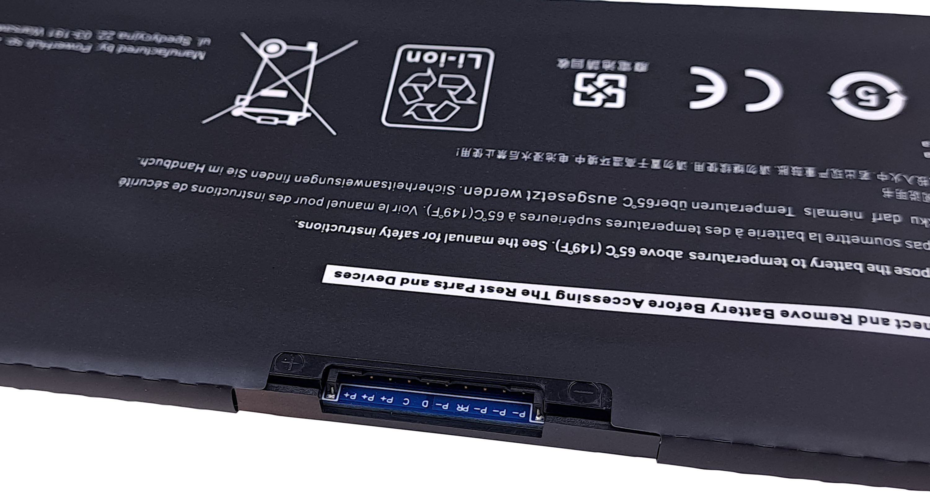 Zbliżenie baterii laptopa z symbolami ostrzegawczymi i złączem.