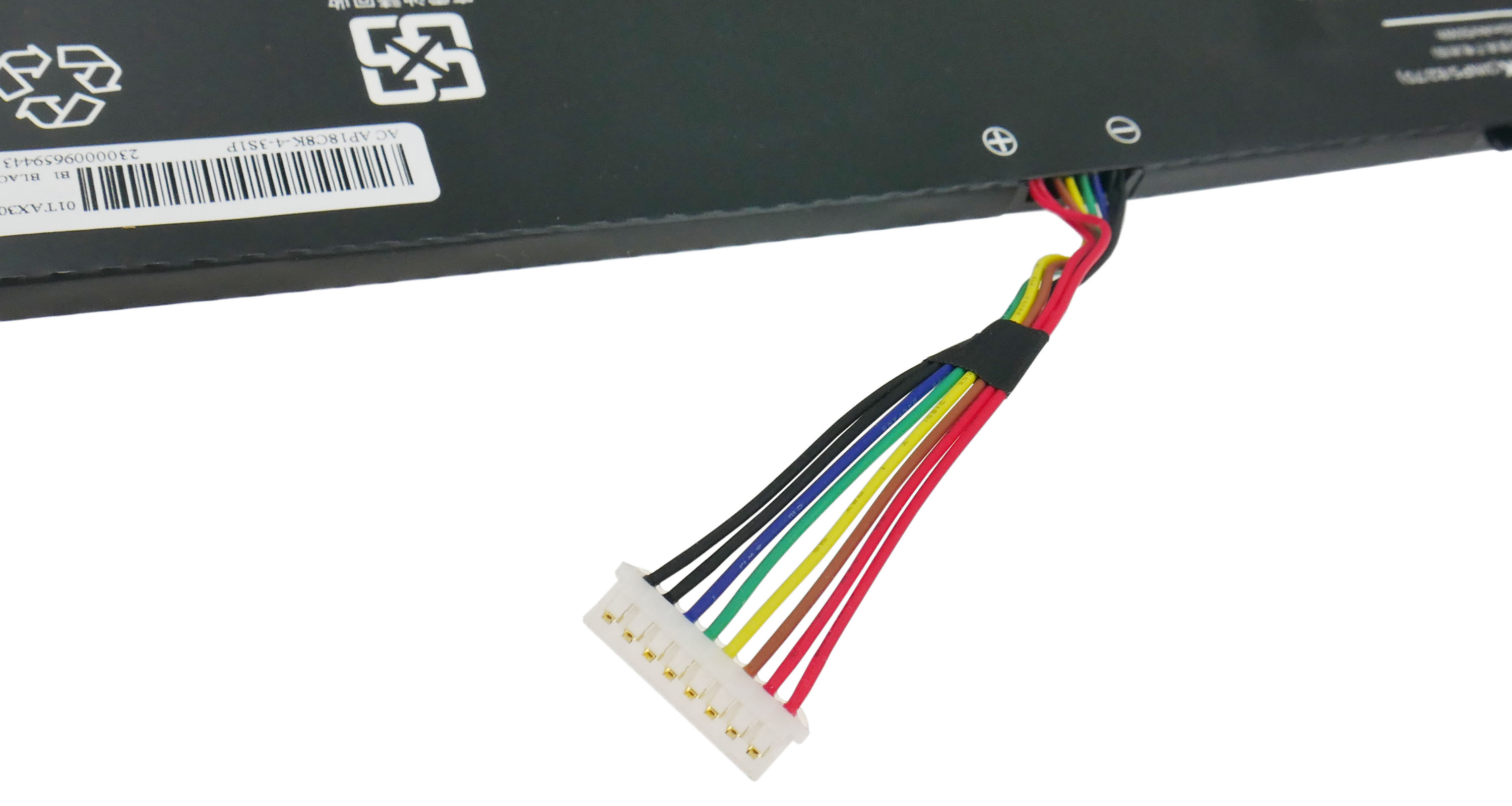 Czarna bateria z wiązką kolorowych przewodów i białym złączem.