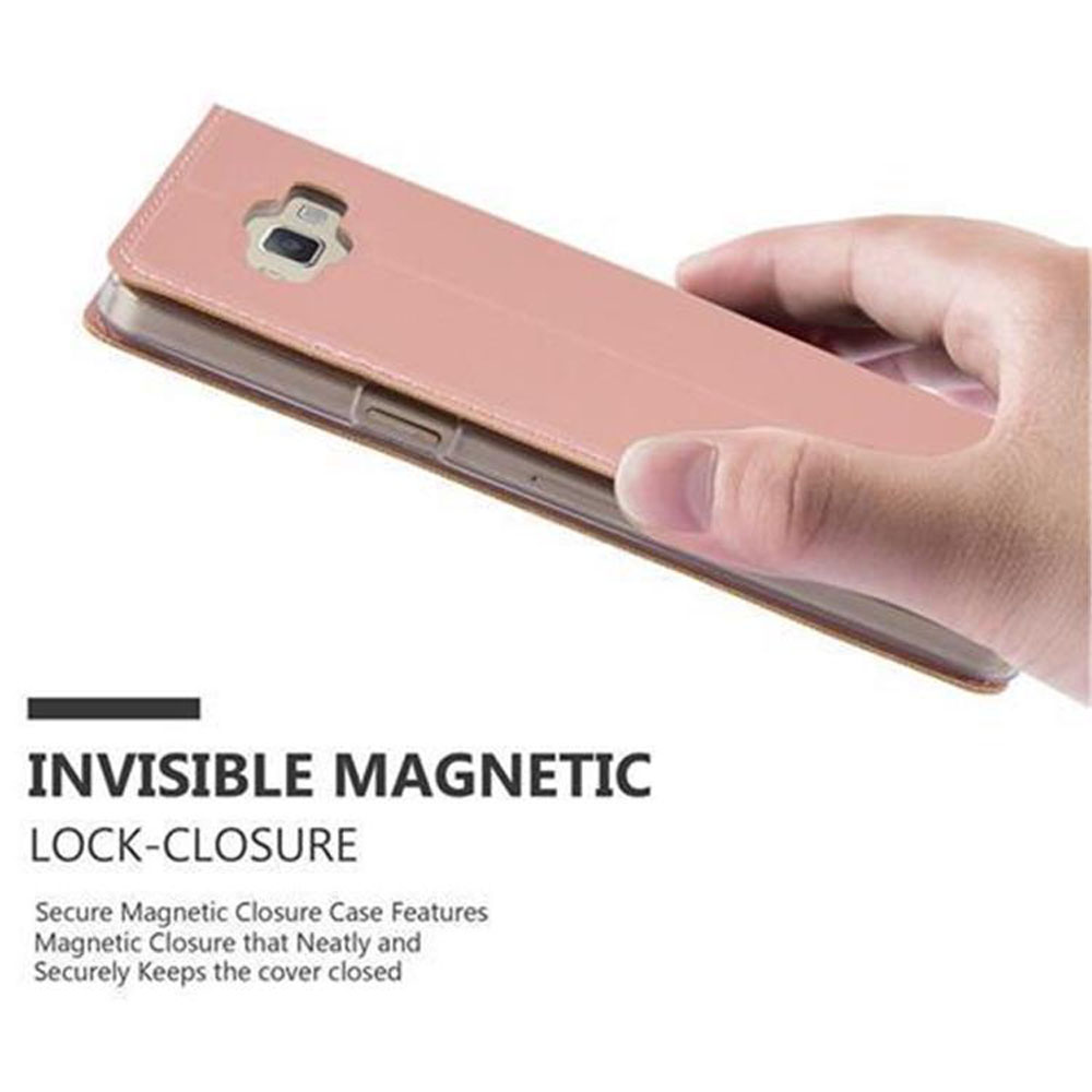 Hand hält eine rosafarbene Handyhülle mit magnetischem Verschluss.