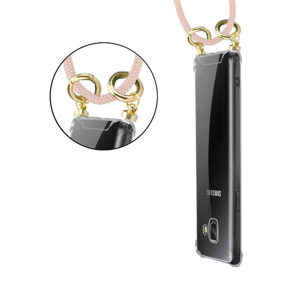 Una funda transparente para móvil con cordón rosa y anillas doradas.