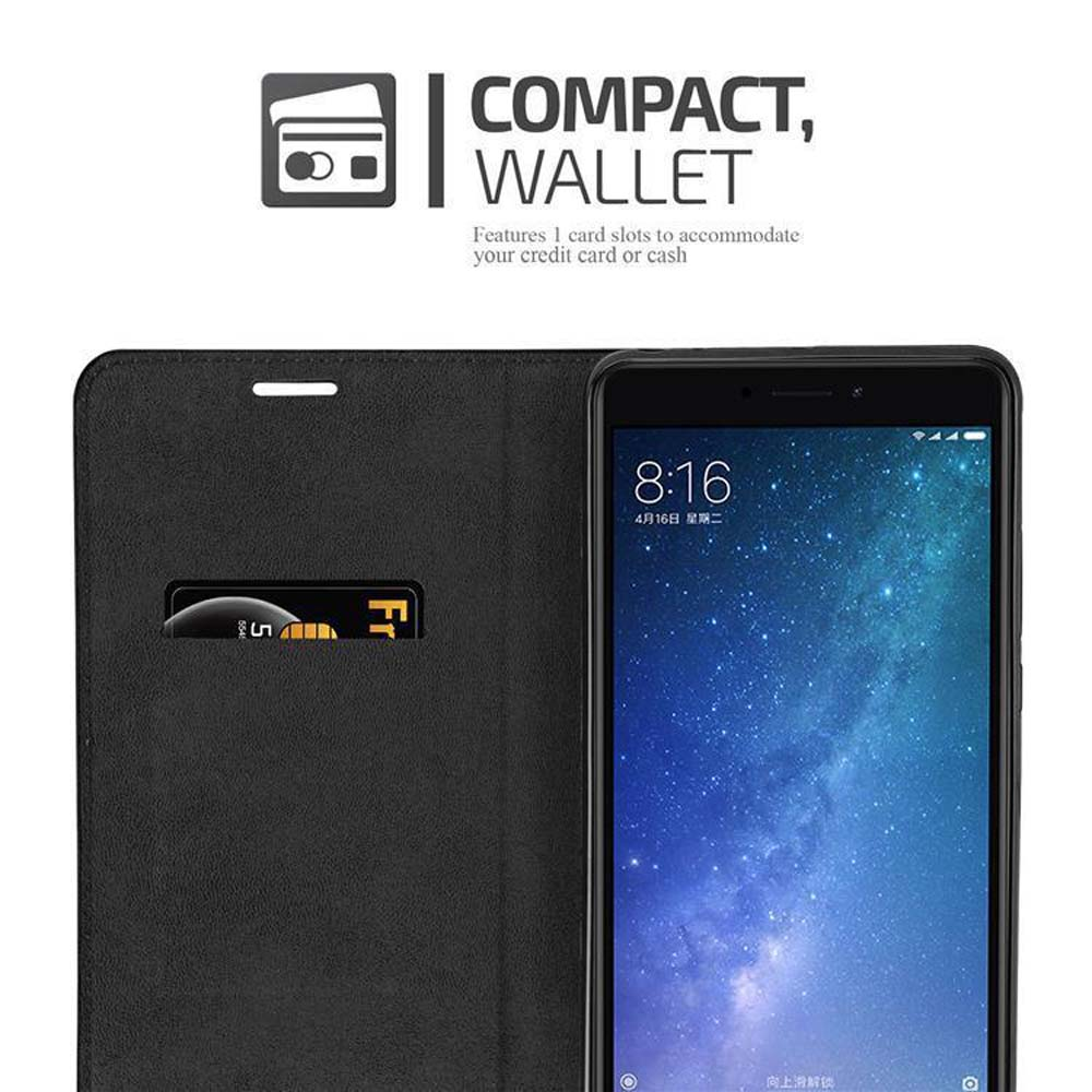 Telefono nero in custodia a portafoglio con una carta.