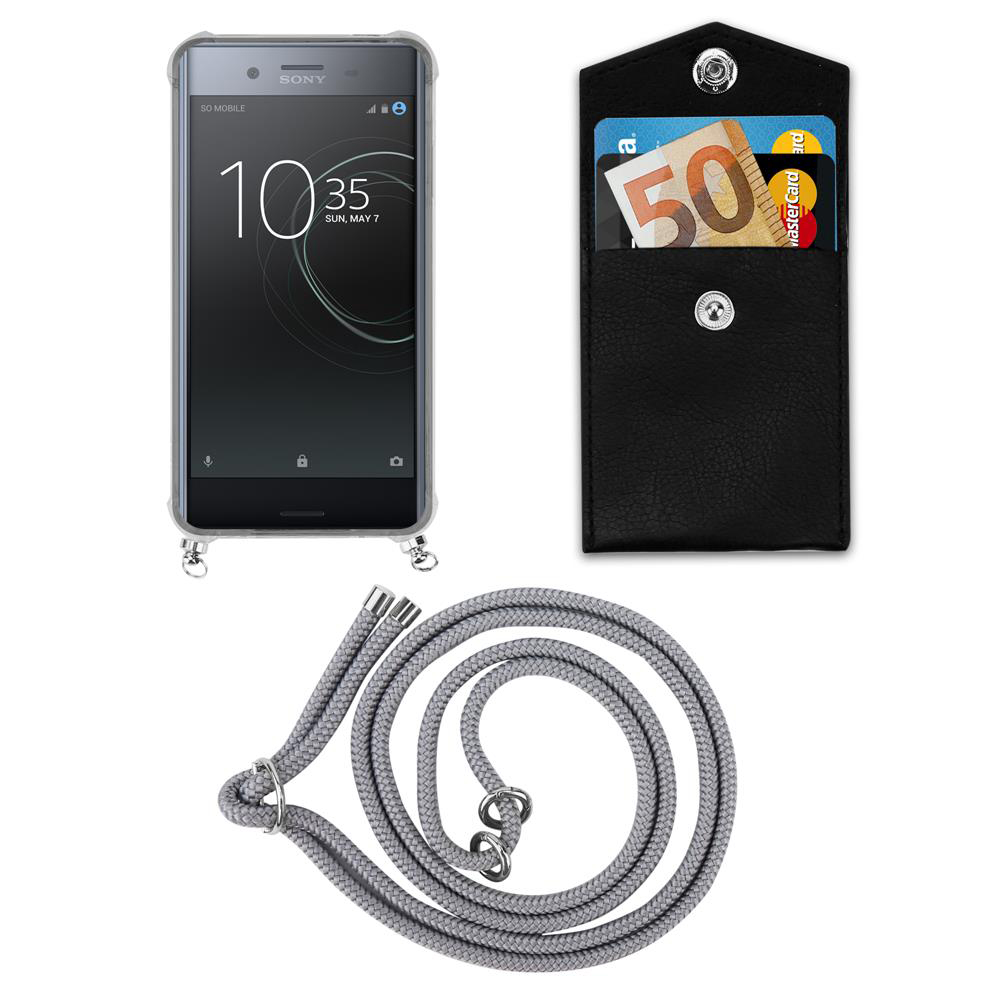 Uno smartphone, un portafoglio nero con soldi e carta, e un cordino grigio.