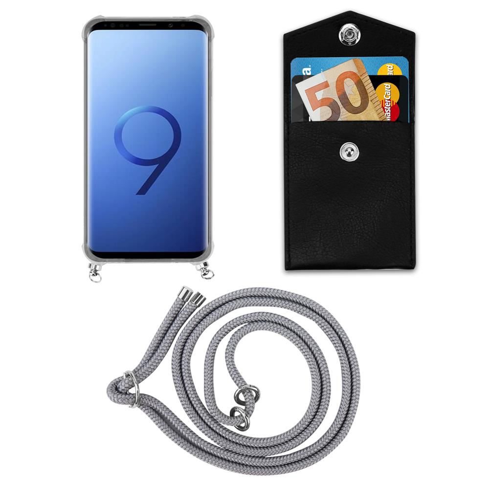 Uno smartphone in una custodia, un portafoglio con soldi e carte, e un laccetto.