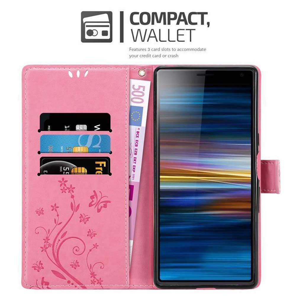 Un portafoglio rosa con telefono, carte e banconota.