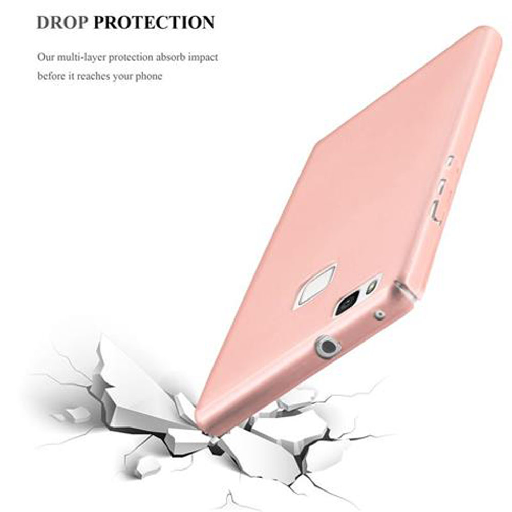 Una custodia rosa per telefono cade su un terreno crepato.