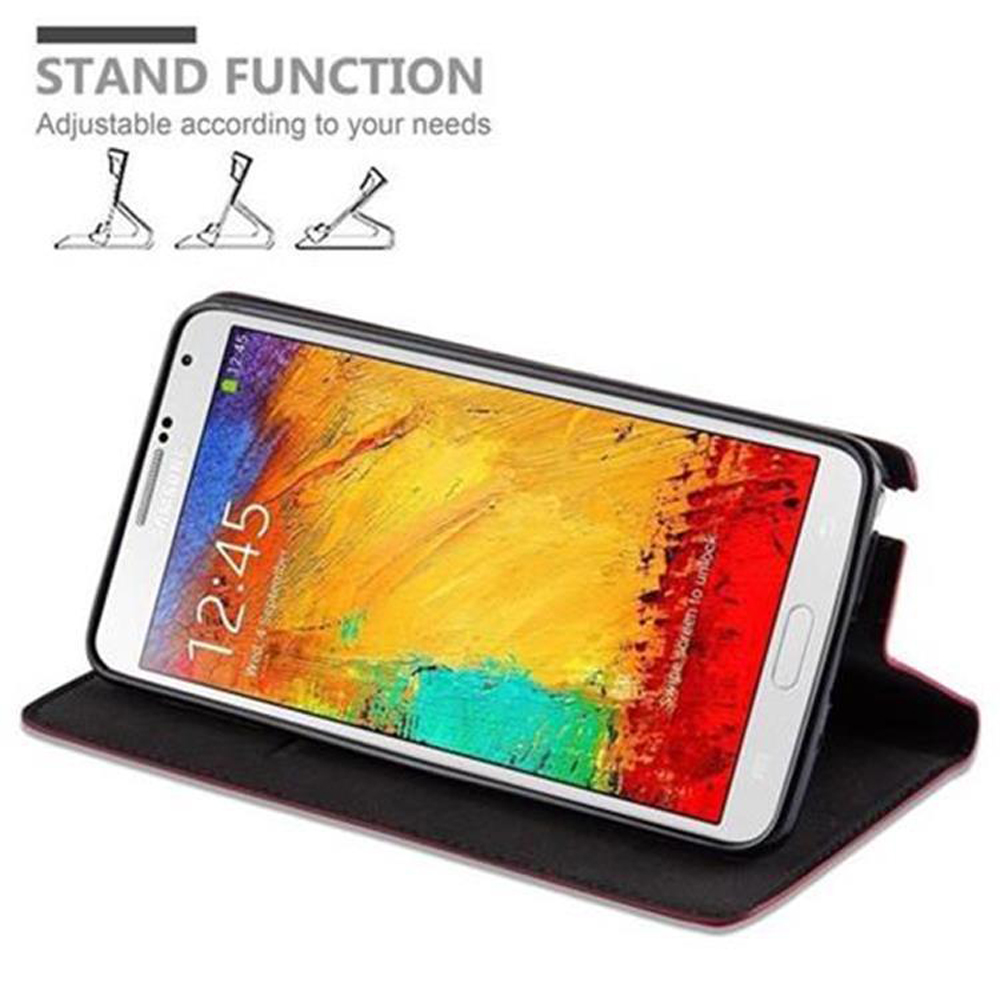 Un telefono in custodia nera con funzione stand. Lo schermo mostra le 12:45.