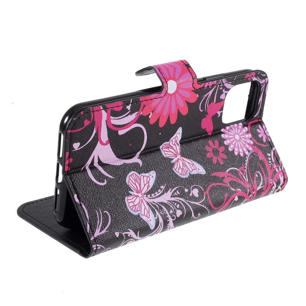 Custodia nera per telefono con disegno floreale e farfalla rosa.