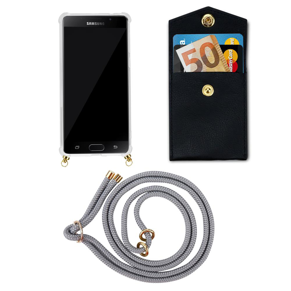 Funda de móvil, cartera con dinero y tarjetas, y cordón gris.