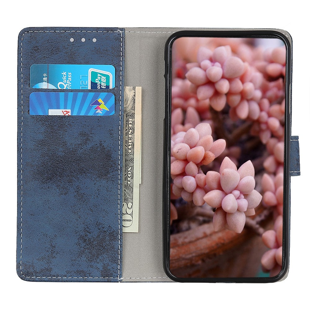 Custodia blu per telefono con slot per carte e contanti, mostra una pianta succulenta.