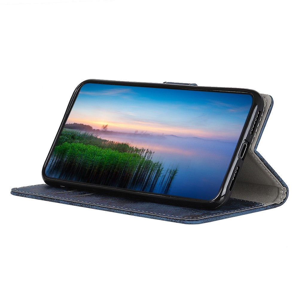 Custodia blu scuro per telefono che mostra un tramonto su un lago con canne.