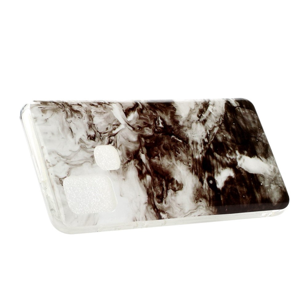 Una cover trasparente per telefono con motivo a marmo bianco e nero.