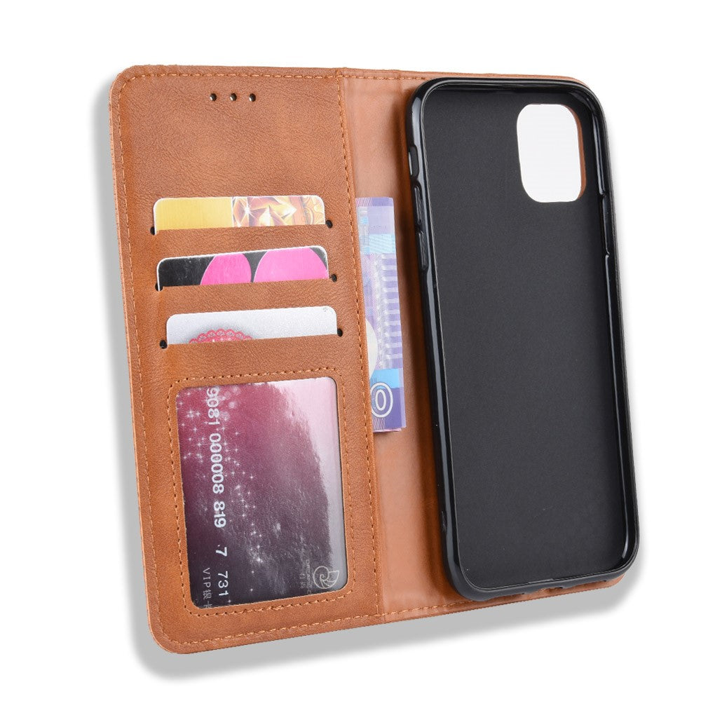 Custodia a portafoglio in pelle marrone con slot per carte e inserto nero.